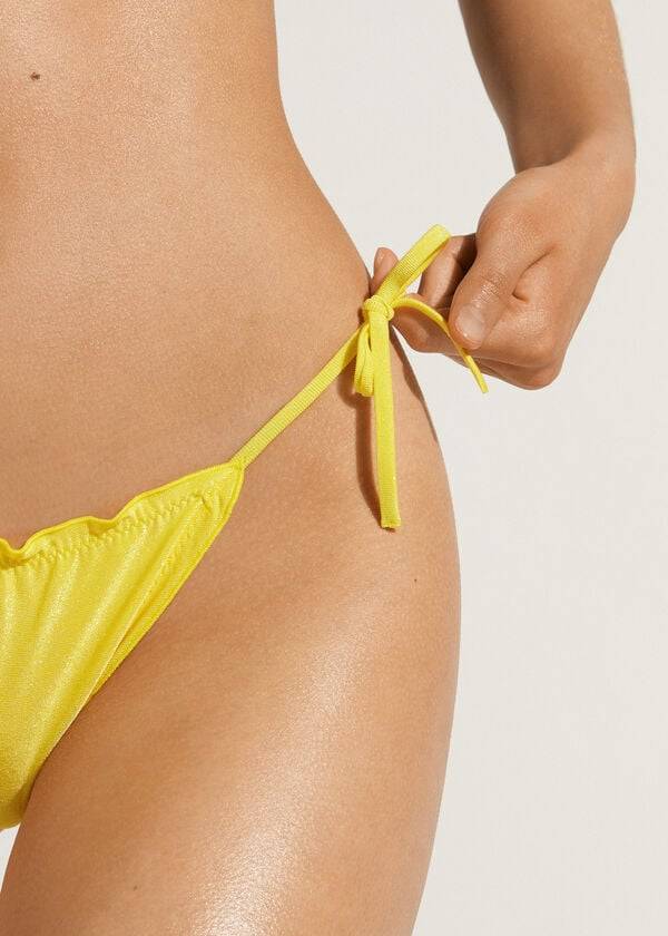 Ženski bikini spodnji del calzedonia brazilske vrvice formentera rumene barve